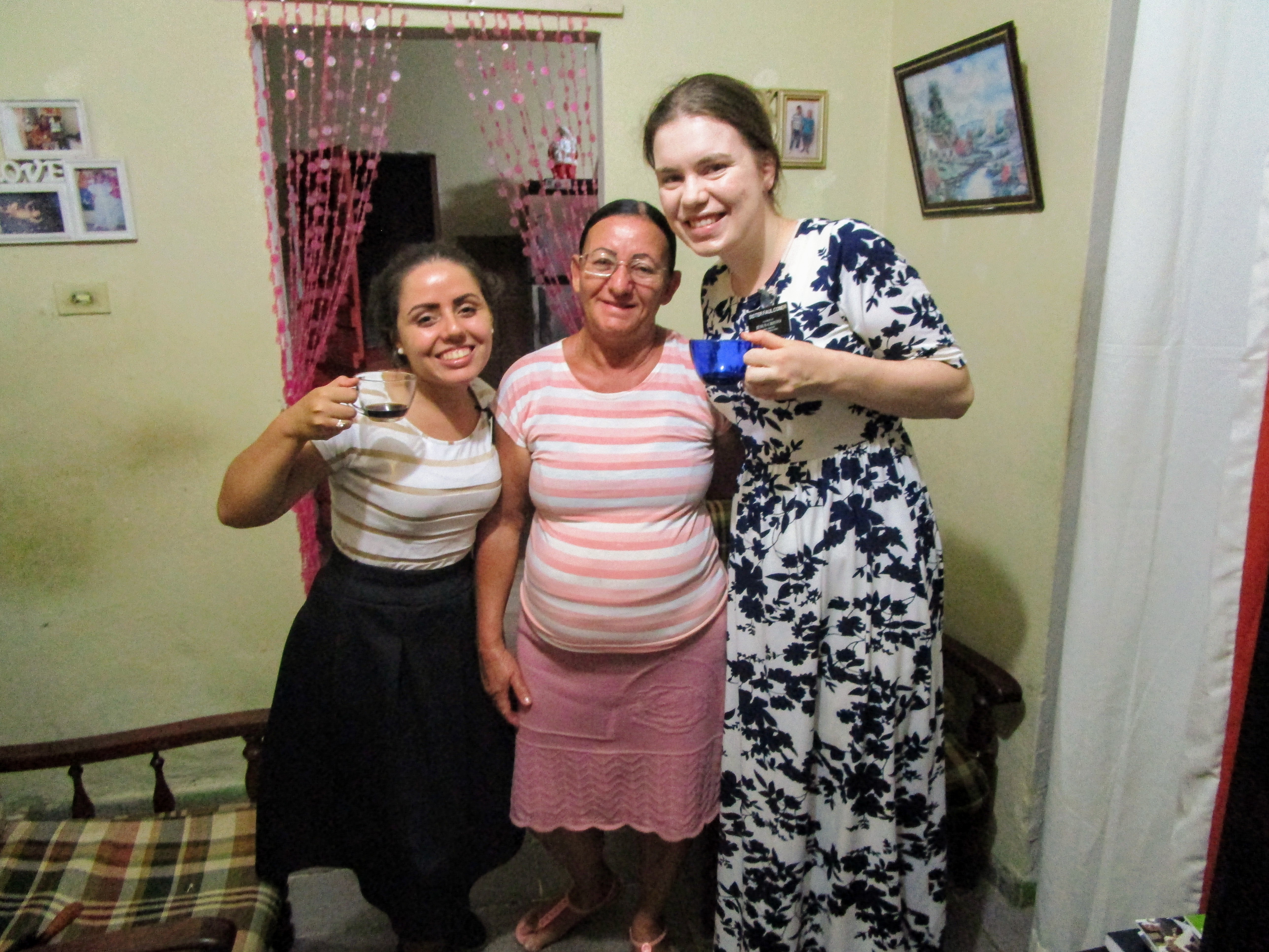 Left to right: Sister Porcote, Sister Dolores, Sister Faulconer. Sister Porcote and Sister Faulconer are each holding a cup of a dark liquid that must be Cevada--some sort of substitute hot drink for coffee.