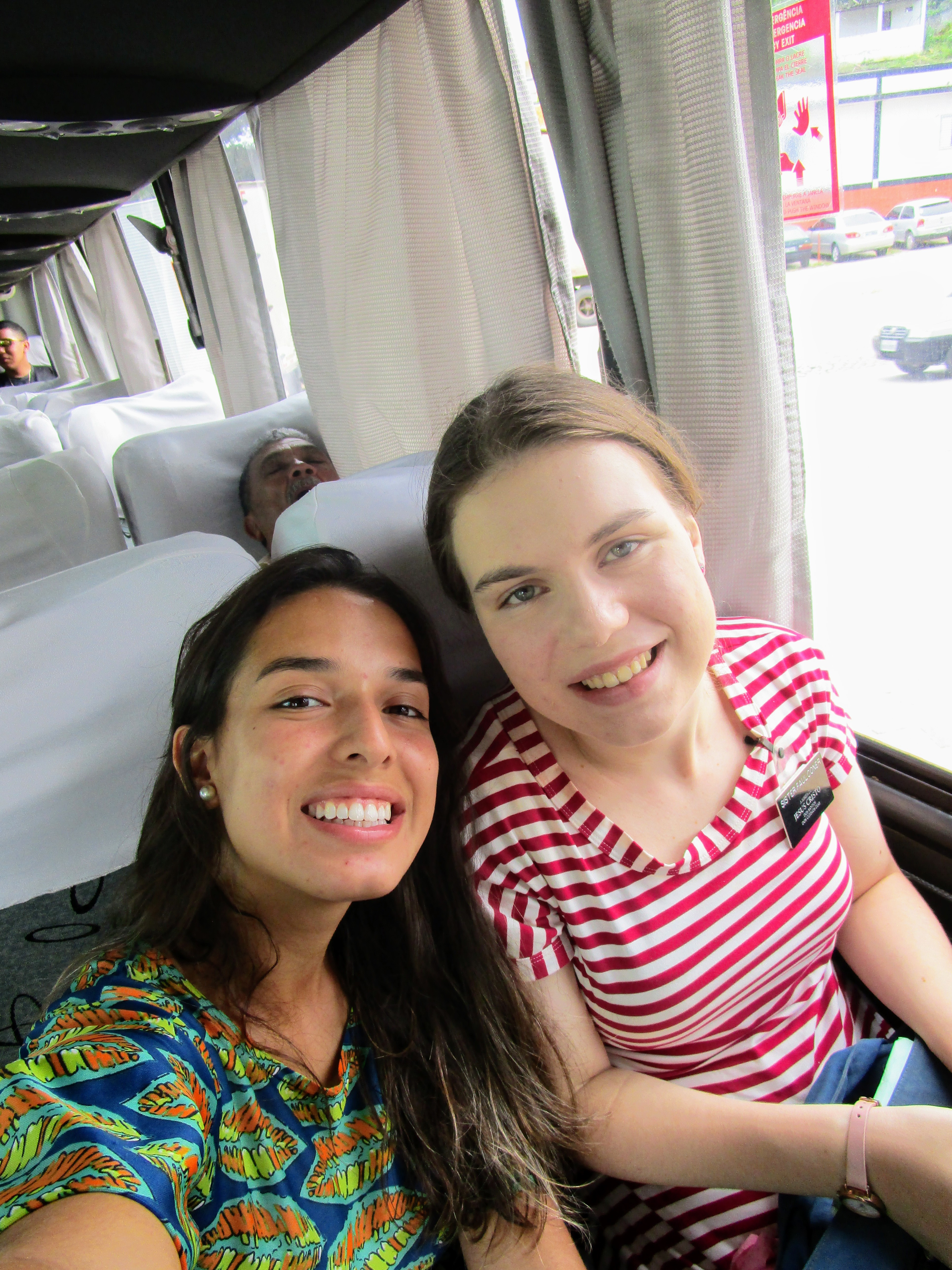 A sister training leader and Sister Faulconer, two sister missionaries sitting on a bus bound for Guarahuns