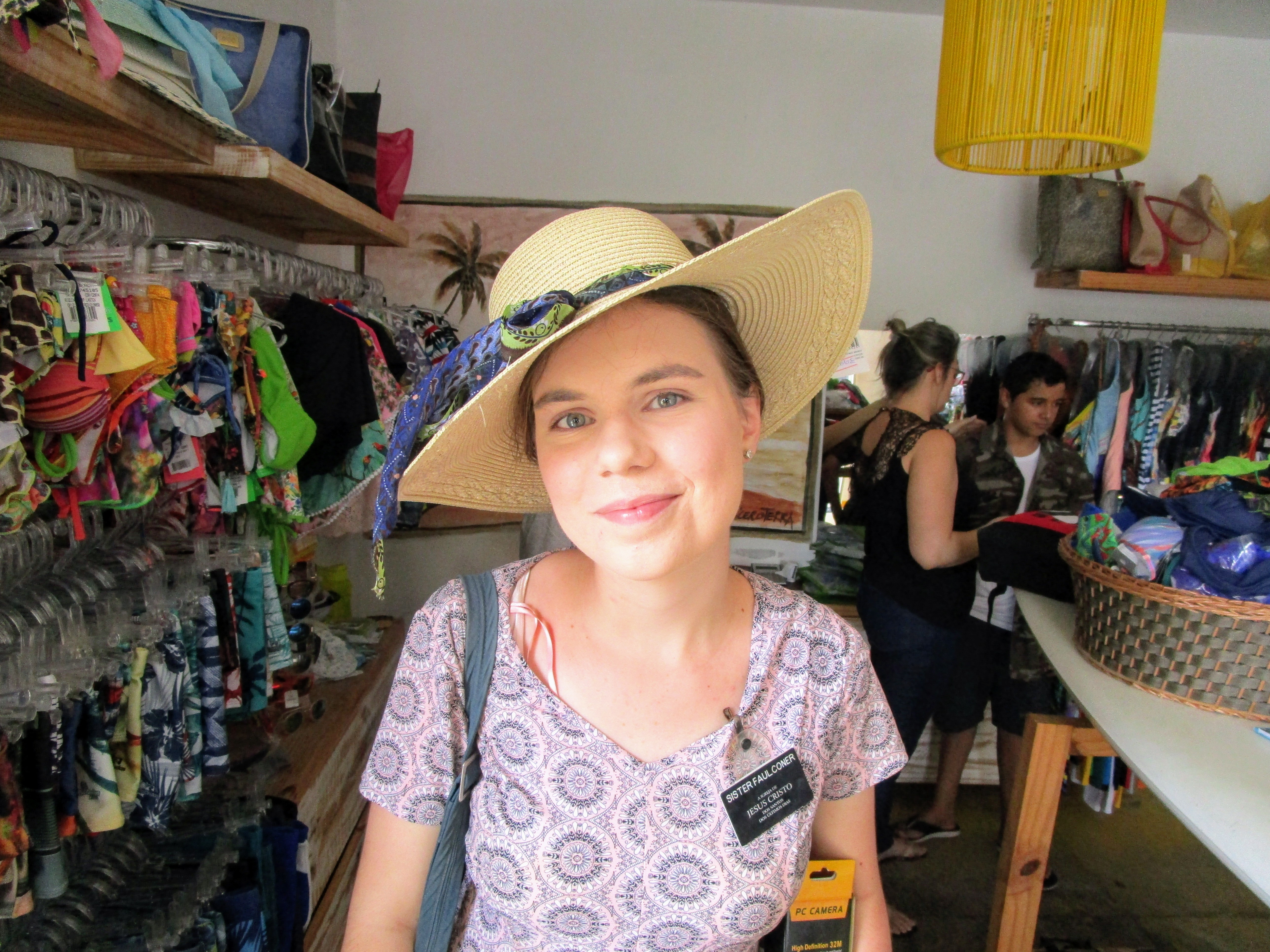 Sister Faulconer, a missionary for the Church of Jesus Christ of Latter-day Saints, poses for a picture in a pretty hat.
